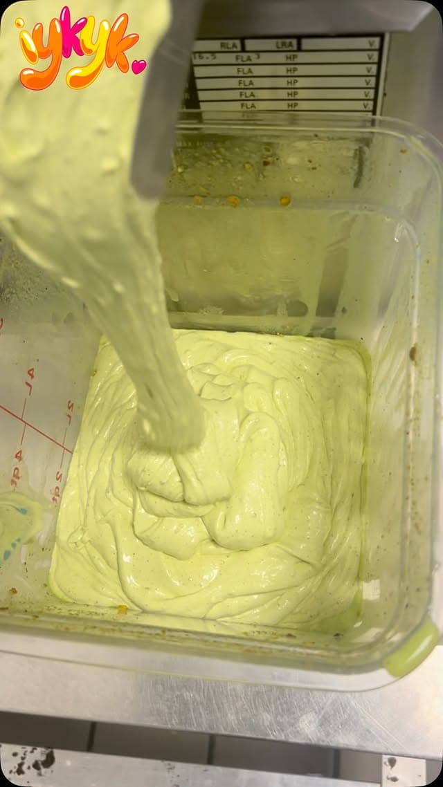 Fresh pistachio ice cream being churned in the small-batch machine